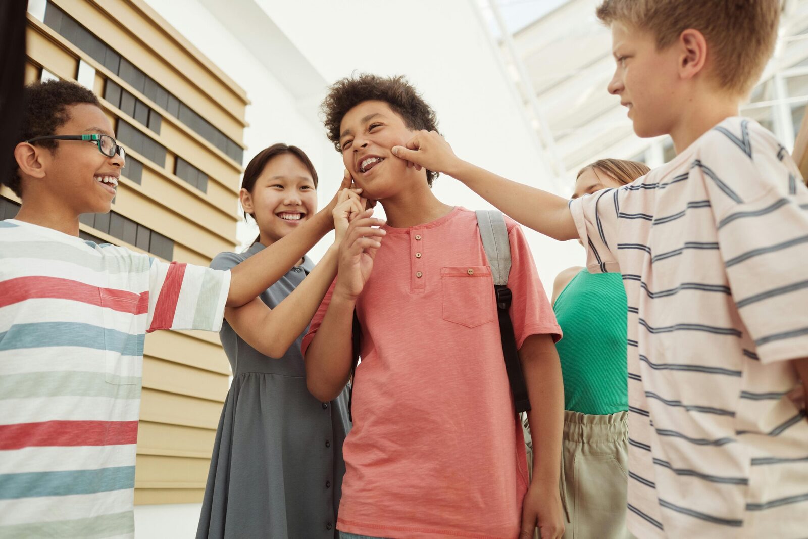 Primary years students laughing together